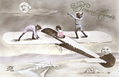 Cartolina di Capodanno con bambini su un aereo (foto a colori) da French Photographer
