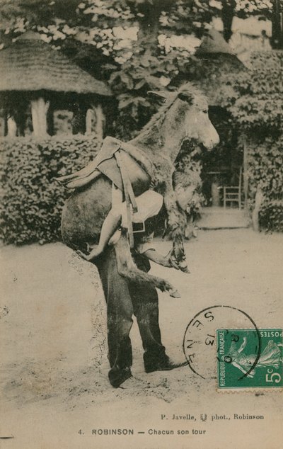 Robinson, Chacun don tour. Giovane uomo che porta un asino da French Photographer