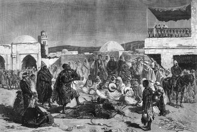 Un incantatore di serpenti sulla piazza del Souk di Beja in Tunisia da French School