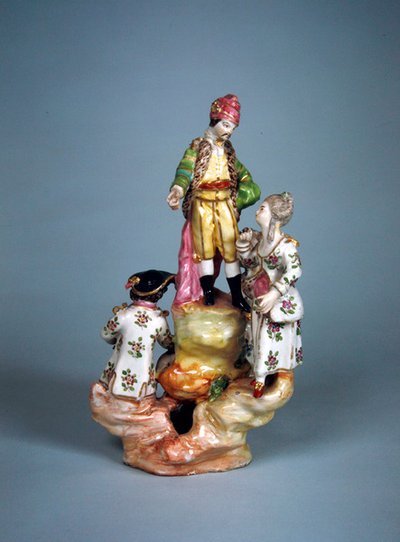 Statuetta di quattro persone raggruppate su una roccia (faience) da French School