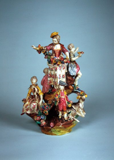 Statuetta di donne e bambini raggruppati su una roccia (faience) da French School