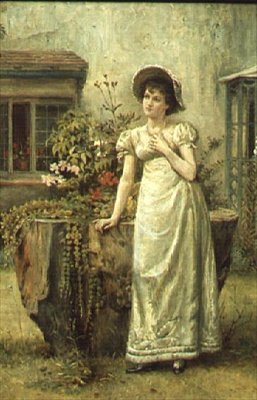 Giovane donna accanto a un ceppo d
