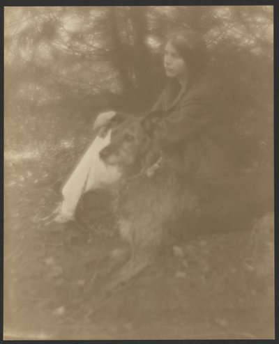 [Donna seduta con cane] da George H. Seeley