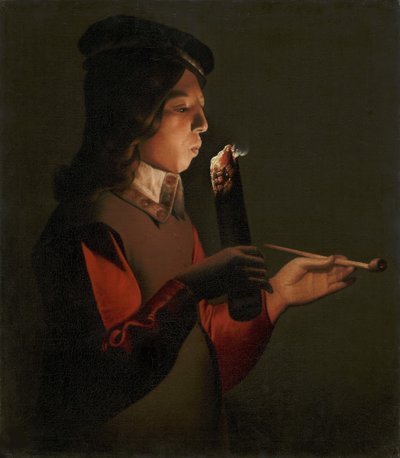 Un giovane ragazzo con una pipa, soffia su un tizzone da Georges de La Tour