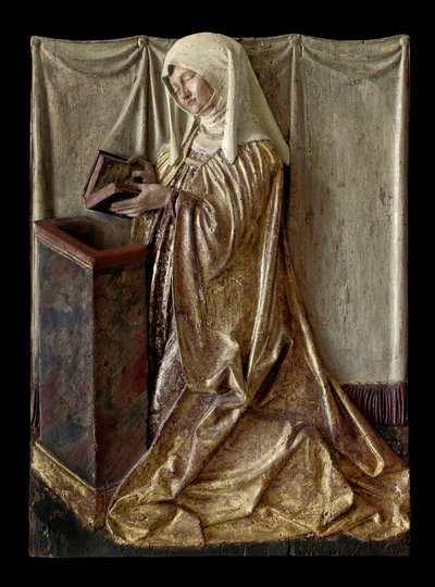 Donatore inginocchiato. Frammento di un altare scolpito in legno policromo. Dalla Svevia. Circa 1520. Parigi, Museo del Louvre da German School