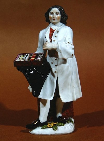 Statuetta di Meissen di un venditore di occhiali da German School
