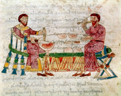 Due uomini a tavola durante un pasto dal volume 