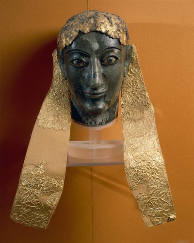 Testa del dio Apollo, con capelli ricci da Greek