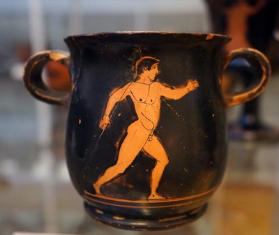 Antico boccale greco rosso su nero raffigurante un atleta da Greek School