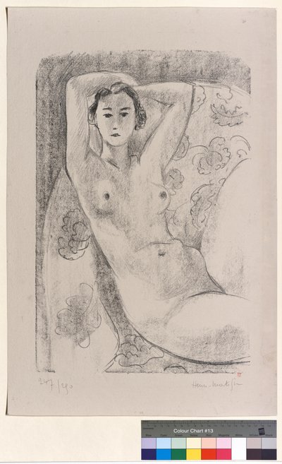Nu seduto su una poltrona con motivi floreali da Henri Matisse