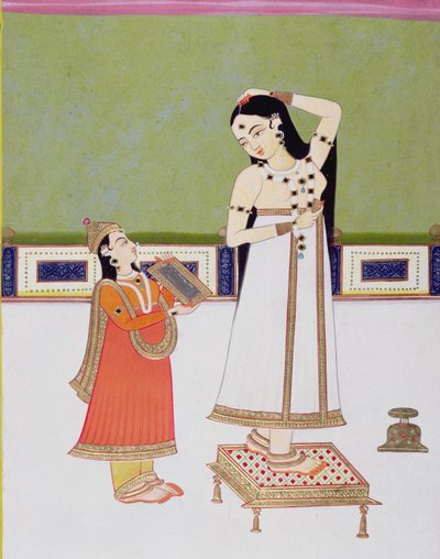 Signora indiana alla toilette che si guarda allo specchio da Indian School