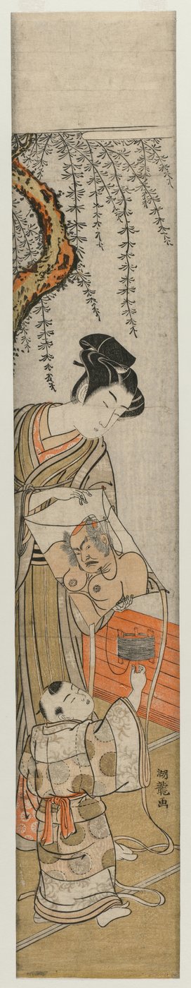 Giovane uomo e bambino con un aquilone da Isoda Koryusai