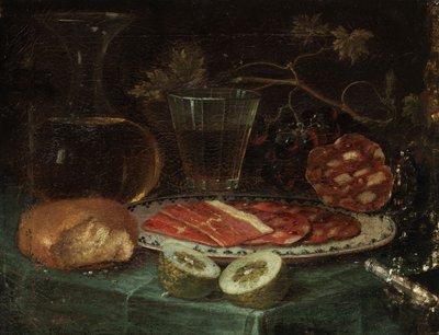 Natura morta con pezzo di pane, caraffa di vetro, bicchiere di vino, piatto con prosciutto e salsiccia di prosciutto, limone e coltello con manico di madreperla da Italo flämischer Maler des 17. Jahrhunderts