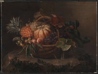 Un cesto di frutta su un ceppo d