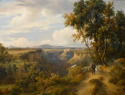 Un capraio e il suo gregge in un paesaggio all