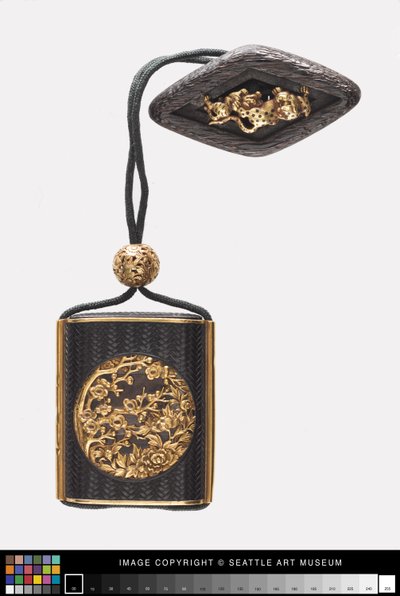 Inro con disegni floreali, ojime e netsuke, XVIII-inizio XIX secolo da Japanese School