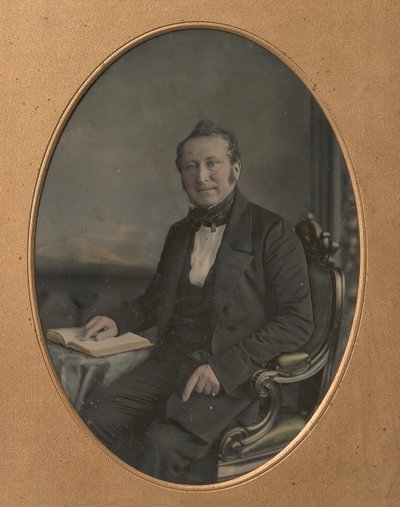 Uomo Seduto che Indica un Passaggio in un Libro Aperto da John Jabez Edwin Mayall