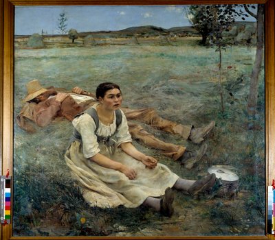 Fieno. Una donna seduta sull