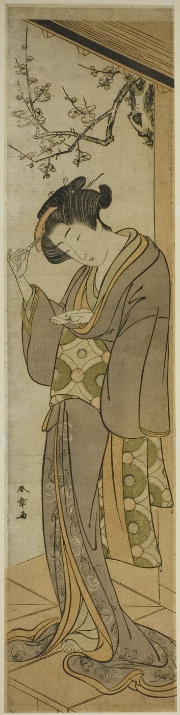 Donna su una veranda che sta per aprire una lettera da Katsukawa Shunsho