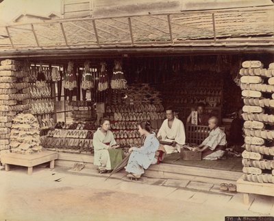 Un negozio di scarpe da Kusakabe Kimbei
