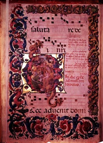 Pagina di musica con una iniziale istoriata G che raffigura l