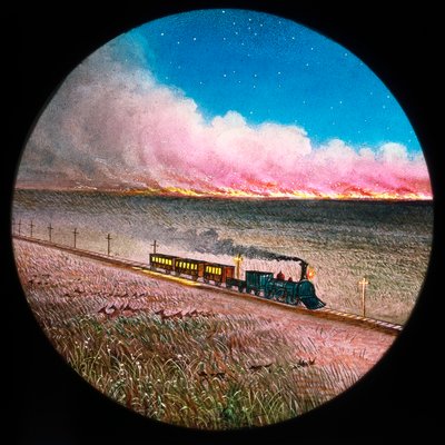 Prateria in fiamme con treno, diapositiva lanterna magica colorata a mano da Unbekannt Unbekannt