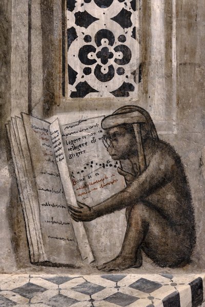 La scimmia con gli occhiali che legge un libro da Luca (workshop of) Signorelli