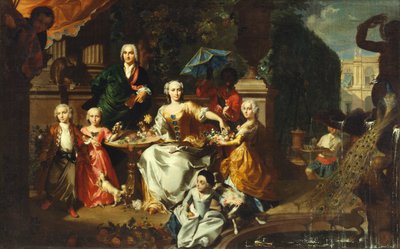 Un gruppo familiare su una terrazza nei giardini di una villa. Possibilmente l