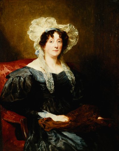 Ritratto di una signora, seduta a mezzo busto, in un vestito blu scuro e un cappello di pizzo bianco con un fiocco blu, che tiene un lavoro di cucito da Margaret Sarah Carpenter