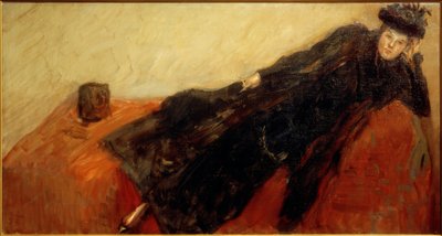 Nini in abito nero su divano rosso da Max Slevogt