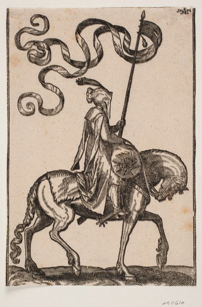 Portabandiera a cavallo, profilo verso destra; lo stendardo è a due code; il cavaliere è disarmato; sulla schiena del cavallo davanti a lui, c
