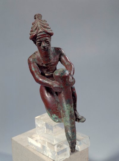 Mesopotamia: figura di fondazione in rame che raffigura il dio che spinge un chiodo da Mesopotamian Mesopotamian