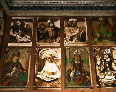 Lo studio di Federico da Montefeltro, Duca di Urbino, in senso orario da TL: filosofi greci Platone e Aristotele; Tolomeo, astronomo; Boezio, filosofo da P. Joos van Gent and Berruguete