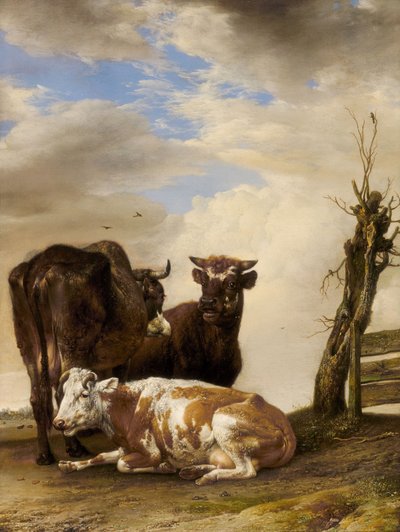 Due mucche e un giovane toro accanto a una recinzione in un prato da Paulus Potter