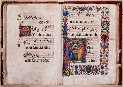 Biblioteca Piccolomini: libro del coro, cod. 102.8, ff. 47v-48r con "Natività" da Pellegrino di Mariano