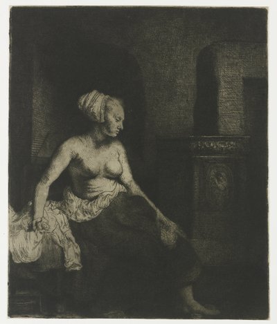 Donna seduta mezza vestita accanto a una stufa da Rembrandt van Rijn