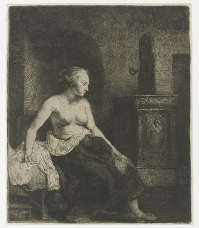 Donna seduta mezza vestita accanto a una stufa da Rembrandt van Rijn