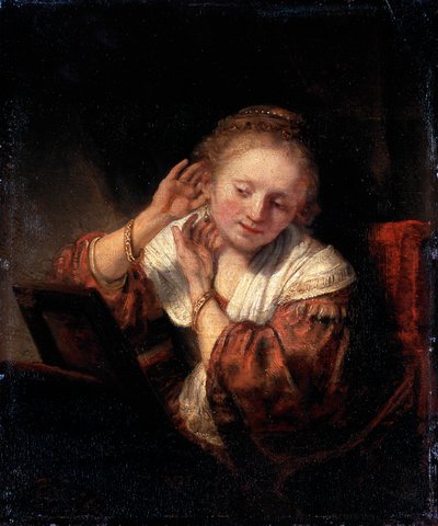 Giovane Donna che Prova Orecchini, 1657 da Rembrandt van Rijn