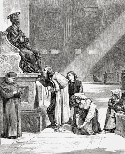 Persone che baciano i piedi della statua di San Pietro all