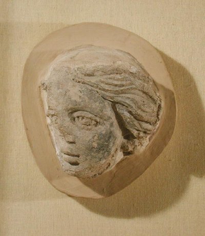 Rilievo raffigurante la testa di una donna, da Tunisia da Roman