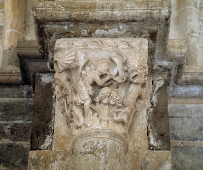 Un musicista e un demone che simboleggiano la lussuria (capitello scolpito) da Romanesque