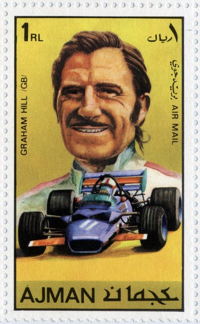 Francobollo degli Emirati Arabi Uniti che rappresenta il pilota automobilistico britannico Graham Hill (1929-1975) da School Arabic