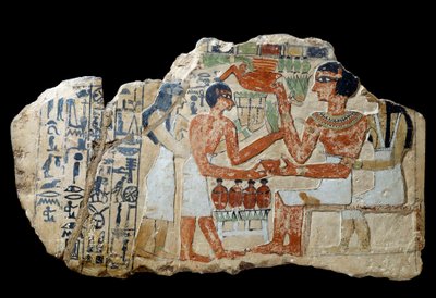 Antichità egizia: stele di Iri in calcare. Una coppia che fa un