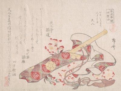 Shakuhachi, un tipo di flauto di bambù, con la sua custodia e fiori di ciliegio da Shinsai