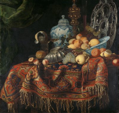Natura morta con frutta, piatti e stoviglie su un tappeto turco da Simon Luttichuys (attributed to)