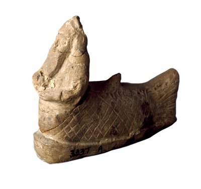 Civiltà sumera: statuetta in terracotta di genio protettivo, a forma di uomo pesce, posta sotto le fondamenta di una casa. VIII-VII secolo a.C. Baghdad, Museo Nazionale dell