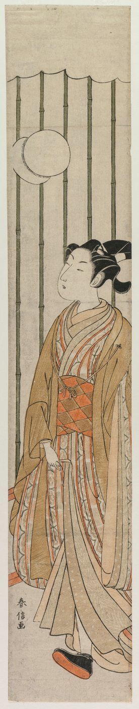 Giovane che gioca a calcio da Suzuki Harunobu