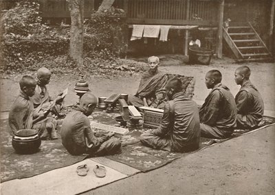 Sacerdote buddista con allievi, 1900 da Unbekannt
