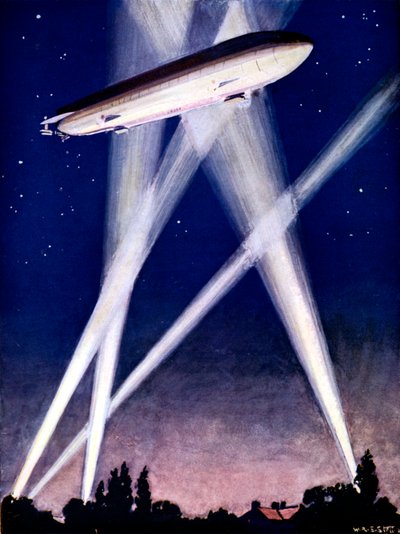 Dirigibile Zeppelin catturato dai riflettori durante un raid di bombardamento sull