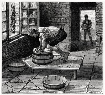 Lavoro del tomme da parte di un casaro dell